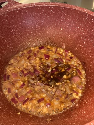 Once softens, add in butter and prepared sauce