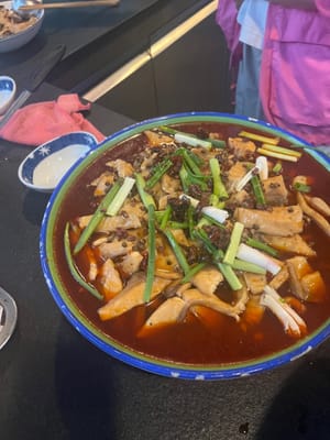 之後撈起花椒擺魚面上