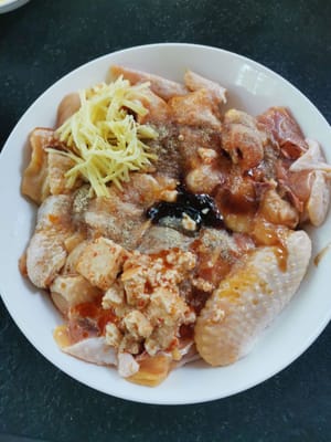 Add all the spices, salt, pepper, sugar, soy sauce, oyster sauce, fermented tofu, tapioca flour and oil and sliced ginger.