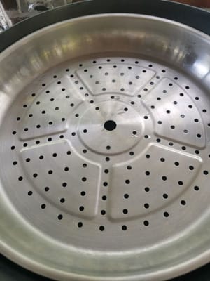 then prepare a frying pan for steaming and wait until the water boils