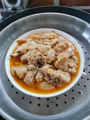 Steamed chicken is cooked