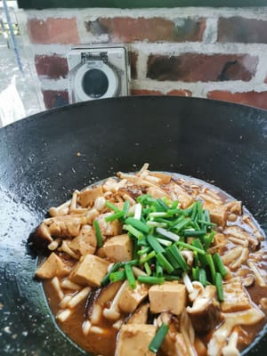 然後（加入蔥）攪拌