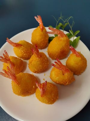 요리 완료! 이 레스토랑의 대표 메뉴인 황금새우볼을 집에서도 쉽게 만들 수 있습니다.