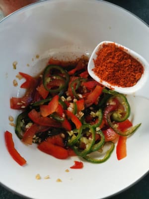 then put it in a container and add the seasoning (dry chili powder, soy sauce)