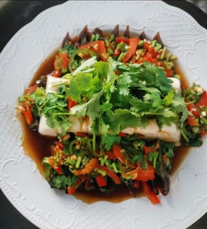 then add sliced coriander leaves on top, and it's ready to be served.