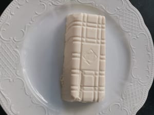 open the tofu wrapper, then put it on a plate