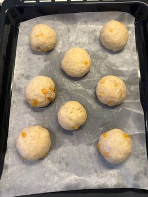 Ulangi langkah ini untuk adonan yang tersisa dan pindahkan ke loyang.