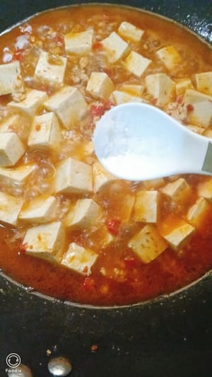 Add a spoonful of sugar and stir-fry for a few more times.