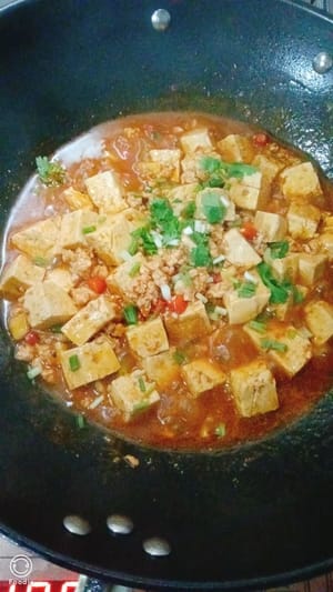 Add onions and serve.
