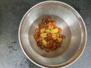 Wash and soak tangerine and sweet and bitter almond for 45 minutes.