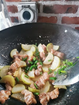 then add the sliced spring onions