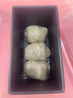 Place the loaf pan in a humid environment at around 30°C and let it rise until it is 80% full (about the height of the edge of the loaf pan). Then you can prepare to bake it.
