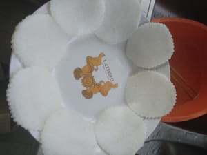 Remove the white radish from the pot and place it on a plate to dry it out for later use.