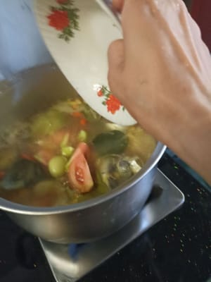 Ajouter les tomates coupées en tranches