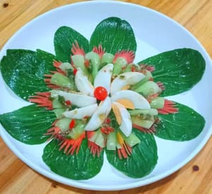 Colocar una pequeña fruta sagrada en el medio.