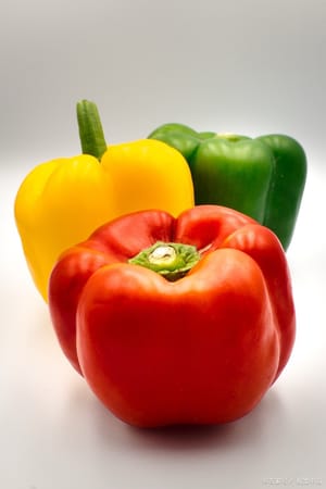 If you can handle spicy food, use chili peppers; if you can't handle spicy food, use bell peppers.