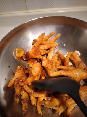 Saute till the chicken feet sauce evaporate.
