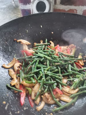 then put in the stir-fried long beans