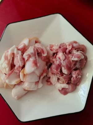 Cut the meat into thin slices with alternating fat and lean parts.