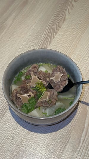 Enfin, garnissez de coriandre et d'oignon vert, dégustez !