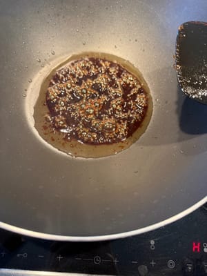 Remove from heat after the rock sugar bubbles, and stir in a circular motion until the bubbles disappear.