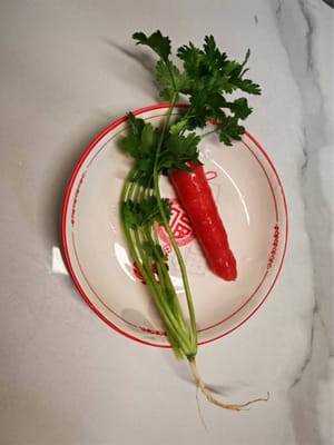 una verdura de Hunan y medio pimiento rojo.