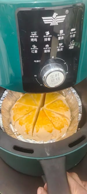 ทาด้วยไข่ที่ตีแล้ว และทอดในหม้อทอดไร้น้ำมันเป็นเวลา 40 นาที