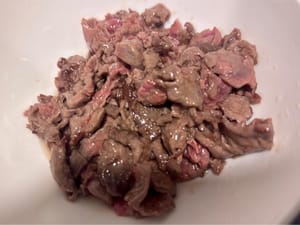 Heat oil in a wok and stir-fry the marinated beef until it is 70% cooked. Set aside.