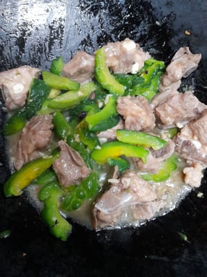 Add the pork ribs, stir well, remove and serve.