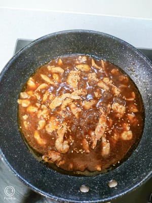 Cover and simmer for two minutes, sprinkle with a little cooked sesame seeds